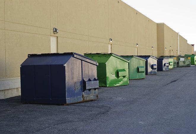 dumpsters lined up for use on busy construction site in Albany, LA